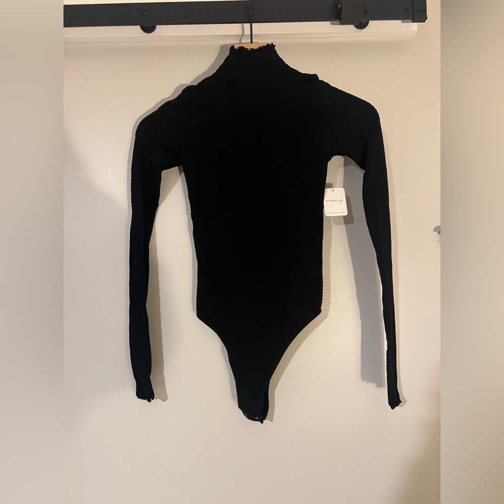 NWT FREE PEOPLE INTIMATELY MOCK NECK SEAMLESS BODYSUIT SIZE M/L IN BLACK